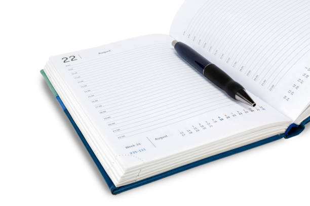 istock Automatic pen lies on the weekly. All on a white background, isolate. 1130265951