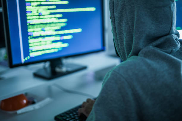 900+ Hacker Behind Computer Stock Photos, Pictures & Royalty-Free ...