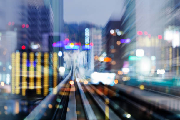 istock Tain track motion leading to blue bokeh light city downtown 1130266171