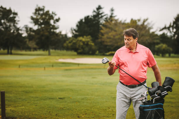 istock Golfer selecting appropriate club 1130267328