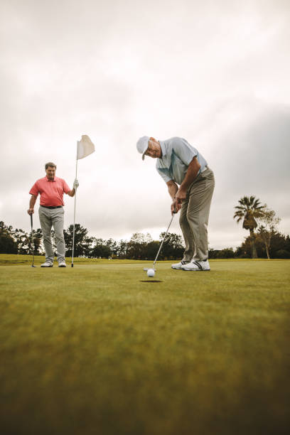 istock Professional golfers playing golf together on the course 1130267405