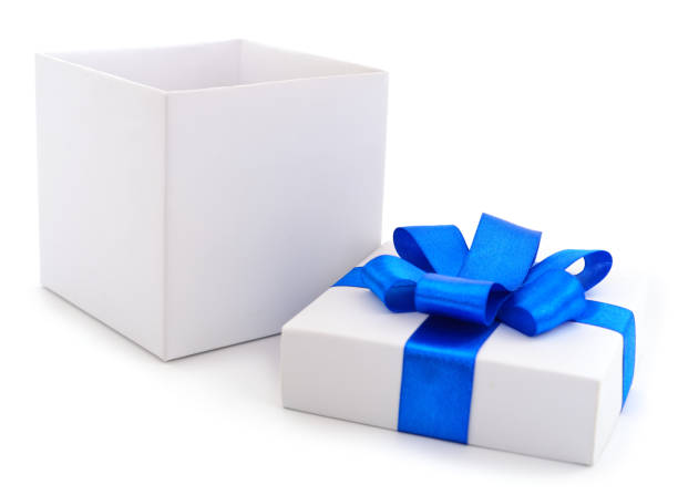 istock White gift box with blue ribbon. 1130268518