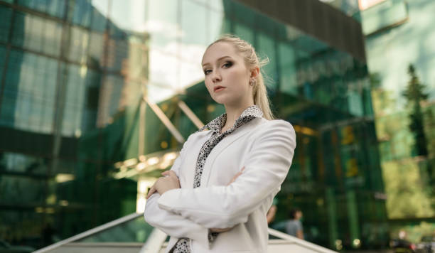 istock Young woman in white jacket. 1130269922