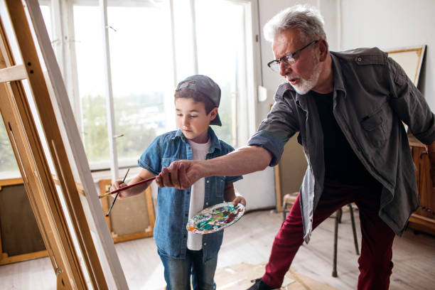 istock Painting class with grandpa 1130271169
