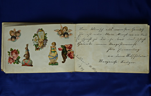 Old poesy and friendships album with coloured motifs stickers. 1899 – 1902, Germany.