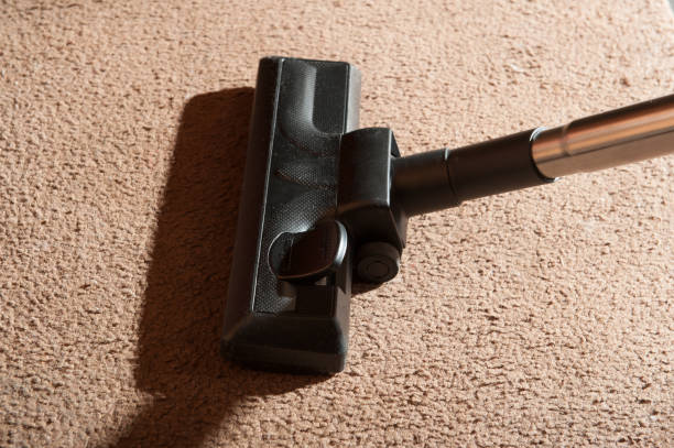 istock nozzle vacuum cleaner on the carpet 1130274680