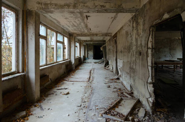 istock School corridor, dead abandoned ghost town Pripyat in Chernobyl NPP exclusion zone (after disaster, 32 years without people), Ukraine 1130278584