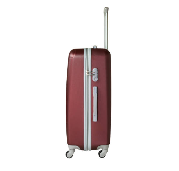 istock Chocolate suitcase isolated on white background. Polycarbonate suitcase isolated on white. Chocolate suitcase. 1130278905