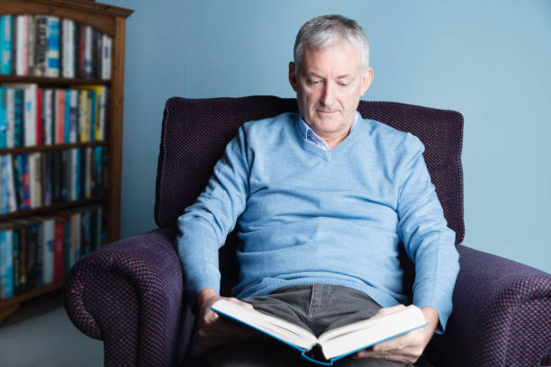 istock Casual man in his 50s reading 1130280259