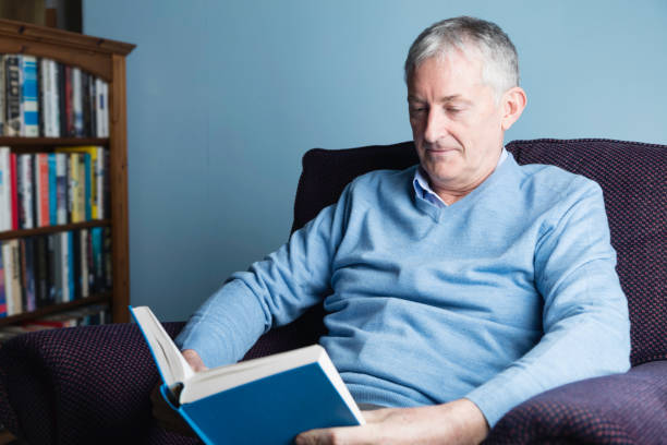 istock Casual man in his 50s reading 1130280873