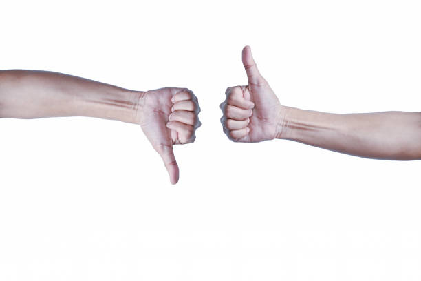 istock Mans are playing rock paper scissors isolated on white background 1130282686
