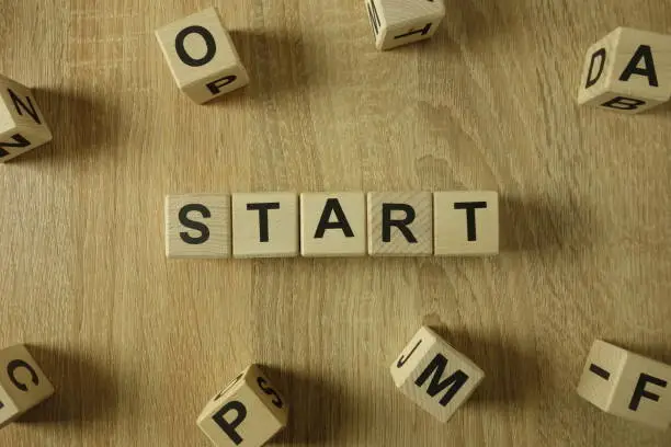 Photo of Start word from wooden blocks