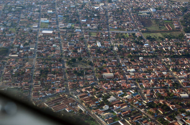Cityscape neighborhood inside airplane, aerial view Cityscape neighborhood inside airplane, aerial view ribeirão preto photos stock pictures, royalty-free photos & images