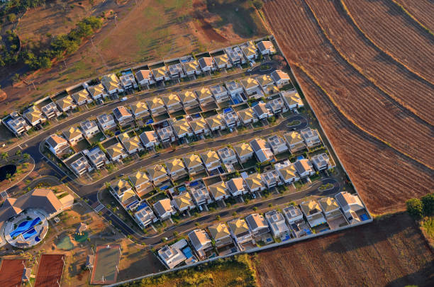 Gated community aerial view at sunrise. Gated community suburban aerial view at sunrise. ribeirão preto photos stock pictures, royalty-free photos & images