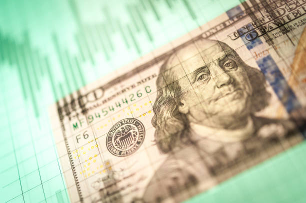 istock Stock market data or forex trading graph and candlestick chart on dollar banknote. 1130286920