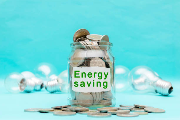 istock Energy saving concept. Paper with text, Background is a light bulb. 1130287127