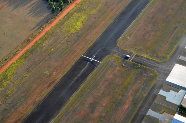 istock Private hangar with runway airplane, aerial view 1130288381