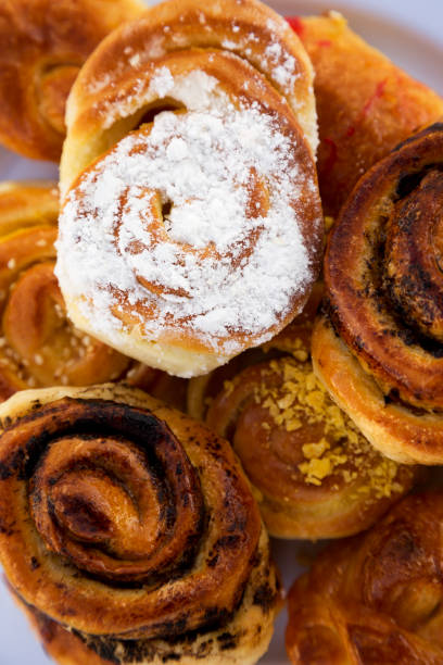 istock Fresh bakery on white plate, overhead view. Flat lay, from above, top view. Close-up. 1130290543