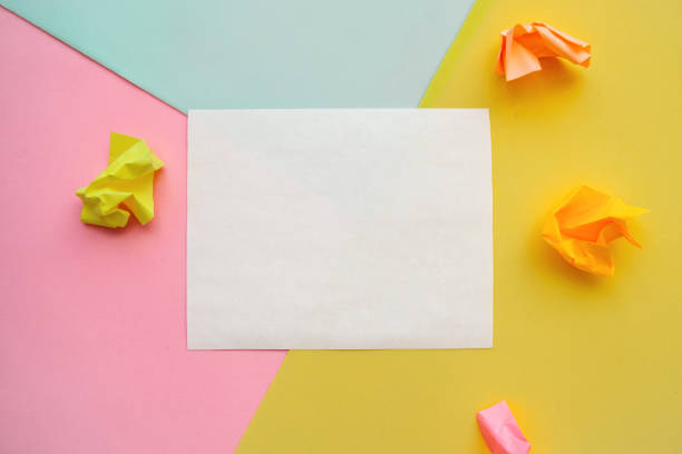 istock Sheet of paper on a colored background 1130290857