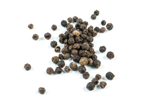 istock heap of black pepper peppercorns isolated on white background 1130292065