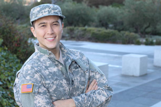 istock Young American soldier with arms crossed 1130292410