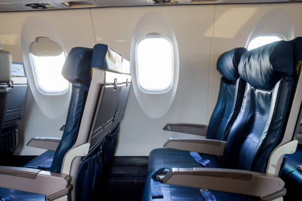 istock Interior passenger airliner cabin flying into a airplane inside interior 1130294979