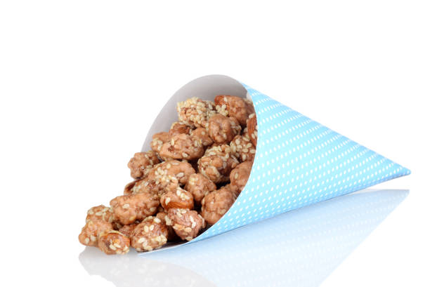 istock blue paper cone of honey sesame seed almonds 1130297368