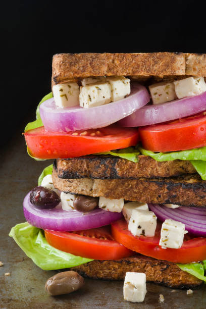 istock feta and fresh vegetables sandwich light meal 1130297646