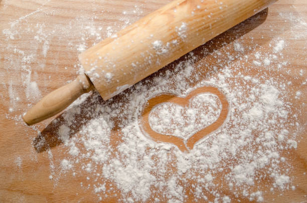 istock There is a heart shape that comes from flour on the kneading board 1130298673
