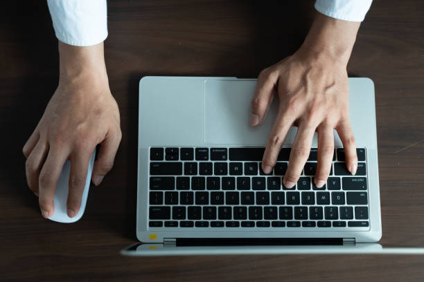 istock Close up hand's of businessman  using laptop 1130298748