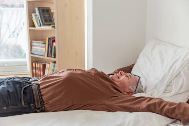 istock Businessman resting at home after hard day at work 1130299921