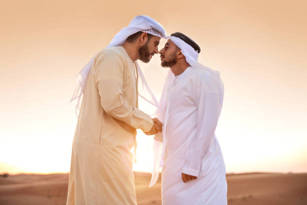 Arab men greetings in the desert out of Dubai