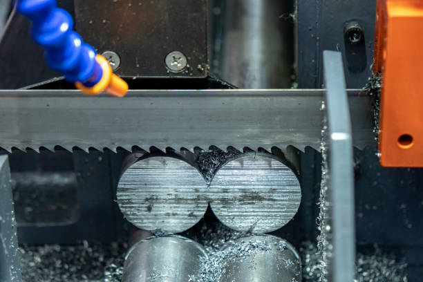 istock The  band saw machine cutting raw metals rods . 1130300608