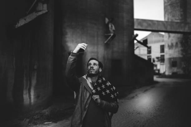 istock Man with American Flag 1130301327