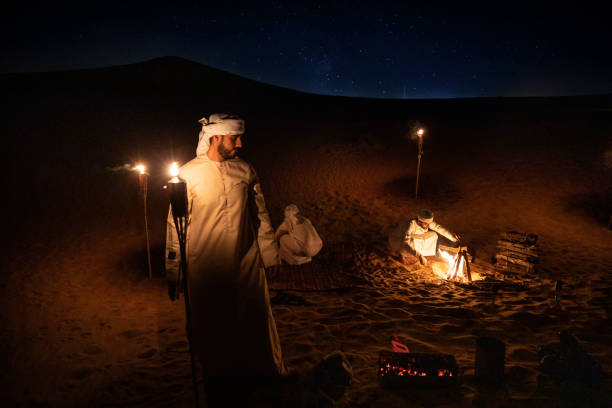 istock Arabs camping at night in the desert 1130301537