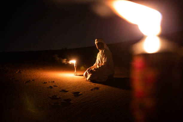 istock Arabs camping at night in the desert 1130301879