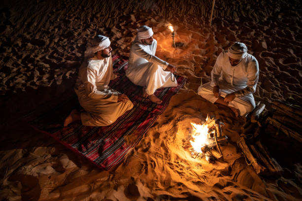 istock Arabs camping at night in the desert 1130301978