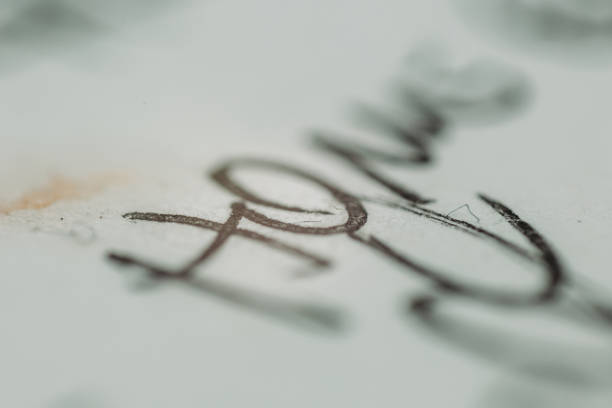 istock Macro Photography writing with Pen 1130307375