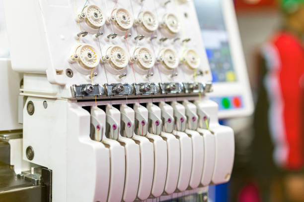 istock tensioner assy thread adjust of modern & automatic high technology multi needle sewing or embroidery machine for textile-clothing-apparel making manufacturing process in industrial in industrial 1130310487