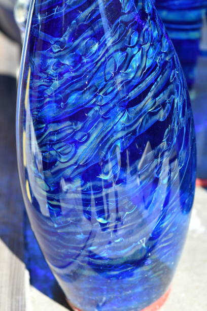 istock Blue and Silver Glass Vase with Red Lip Wrap 1130310760