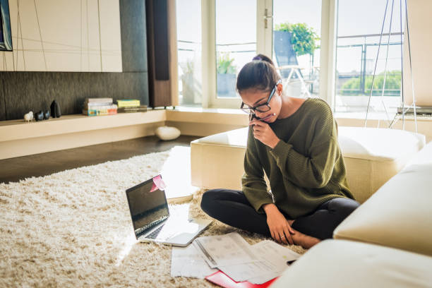 istock young woman studying at home 1130312457
