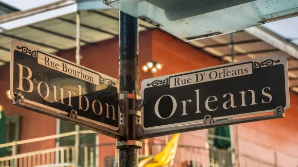 Photo of Bourbon and Orleans street signs in New Orleans, USA