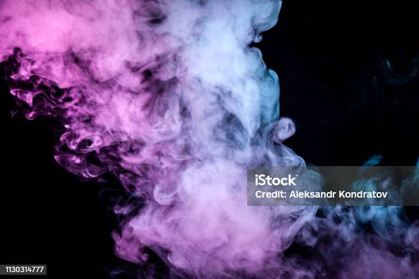 Blue Pink Purple Smoke On Black Background Vape Steam High-Res Stock Photo  - Getty Images