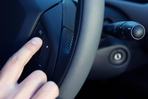 istock Driver Making Hands Free Call In Car With Button On Steering Wheel 1130315981