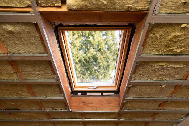 istock Metal frames on attic skylight window and environmentally friendly and energy efficient thermal insulation rock wool 1130316914