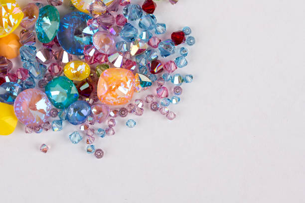 istock Gemstones crystals for jewelry scattered on white background 1130321386
