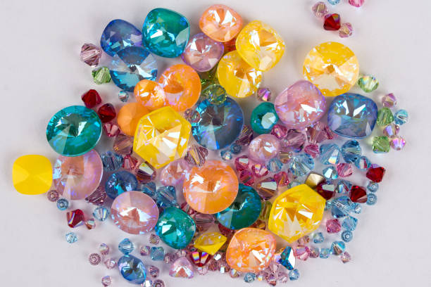 istock Gemstones crystals for jewelry scattered on white background 1130321401