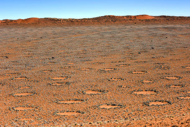 Fairy Circles - Namibia Fairy circles, located in the Namib Desert, in the Namib-Naukluft National Park of Namibia. wolwedans stock pictures, royalty-free photos & images
