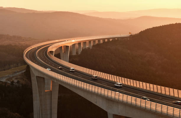 istock Cars driving on a highway viaduct 1130323069