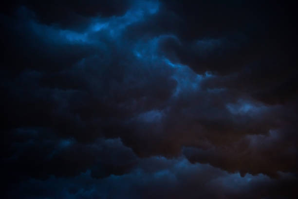 istock Black storm cloud at night, Dark sky and black clouds high contrast 1130324829